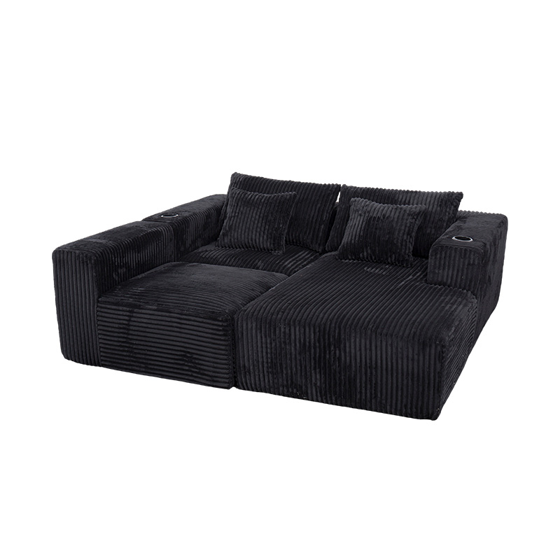 Suuri L-muotoinen kulmasohva mustaa vakosamettia täysvaahtomuovimoduuleilla, useilla tyynyillä ja sisäänrakennetuilla mukinpidikkeillä